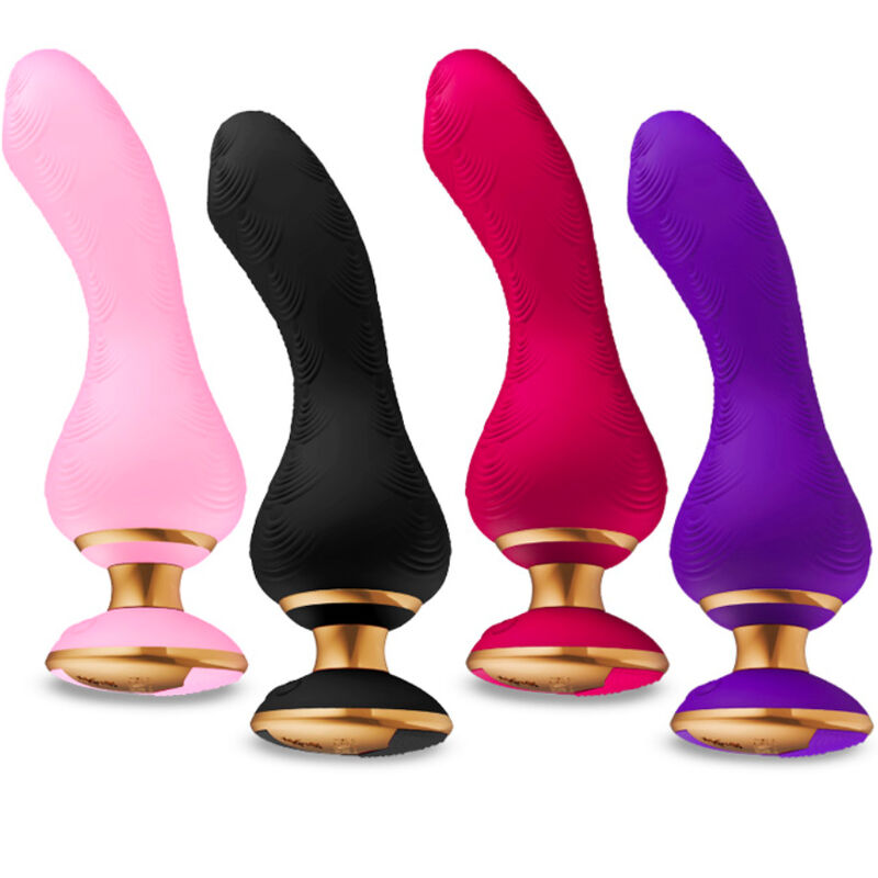 Shunga Sanya - Massaggiatore, colore rosa - in mano per le dimensioni