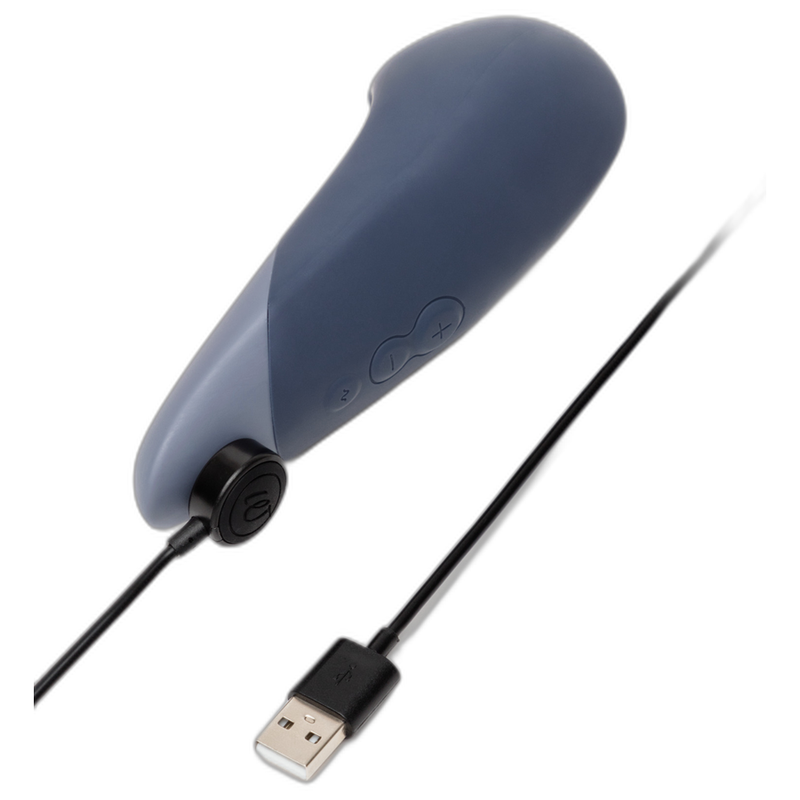 Womanizer Vibe Lay ON - Massaggiatore esterno, colore blu scuro - in mano per le dimensioni