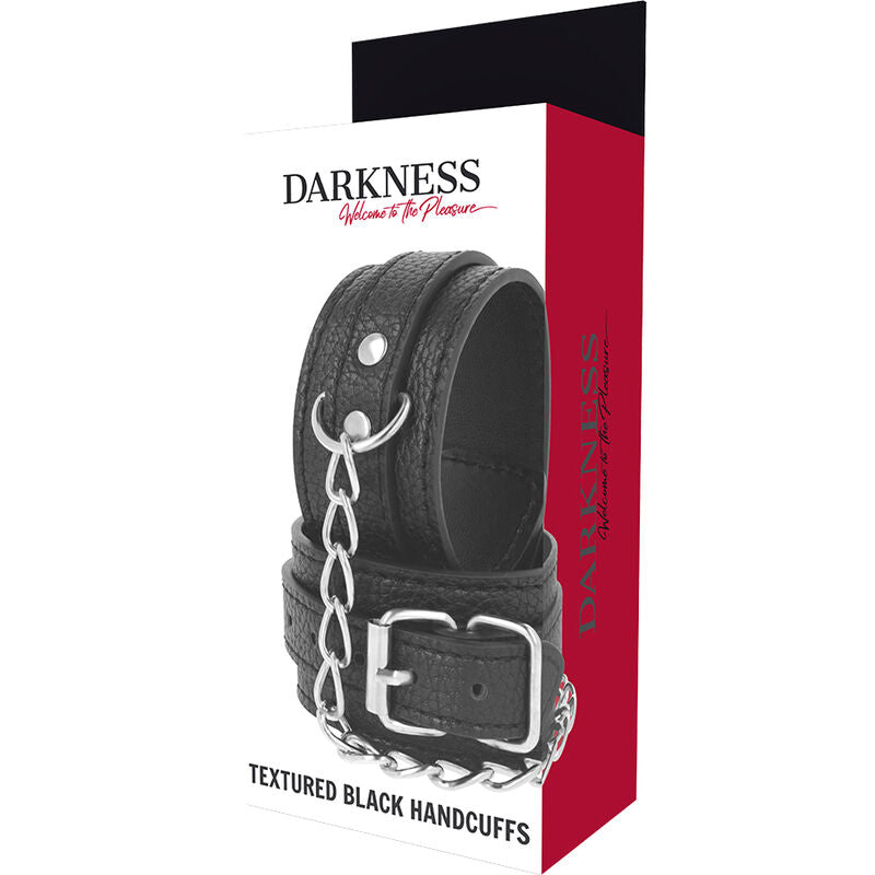 Darkness Manette - Accessorio intimo, colore pelle strutturata nera - in mano per le dimensioni